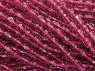 fuchsia, funkelnde, facettierte Tropfenperlen 5x7mm aus K9 K